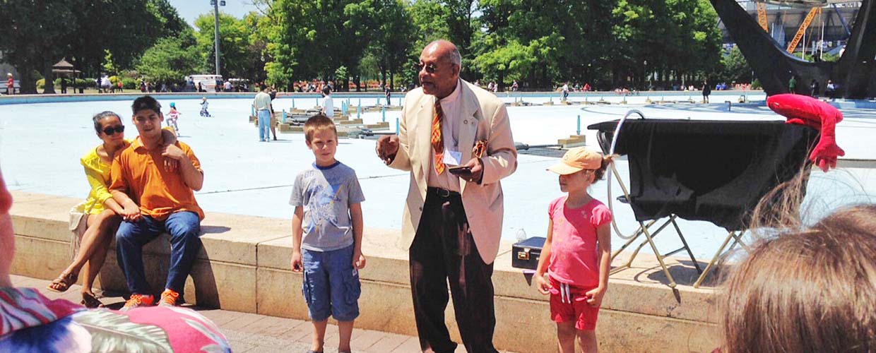 Funeral Director Teddy Lee, seen here entertaining youths at the World's Fair, was named 2016 Magician of the Year by the Parent Assembly #1 of the Society of American Magicians Teddy Lee Entertains Youth at the World's Fair