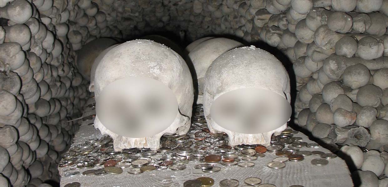 Image of one of the sights at Sedlec Ossuary: Coins Left as Offering, photo by misha - Own work (http://photofile.ru/users/misha_kar/200032623/200331499/), CC BY-SA 3.0, https://commons.wikimedia.org/w/index.php?curid=10727955 Image of one of the sights at Sedlec Ossuary: Coins Left as Offering, photo by misha - Own work (http://photofile.ru/users/misha_kar/200032623/200331499/), CC BY-SA 3.0, https://commons.wikimedia.org/w/index.php?curid=10727955